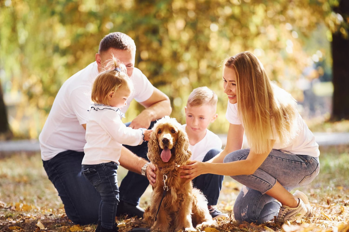 Family with their dog in the park